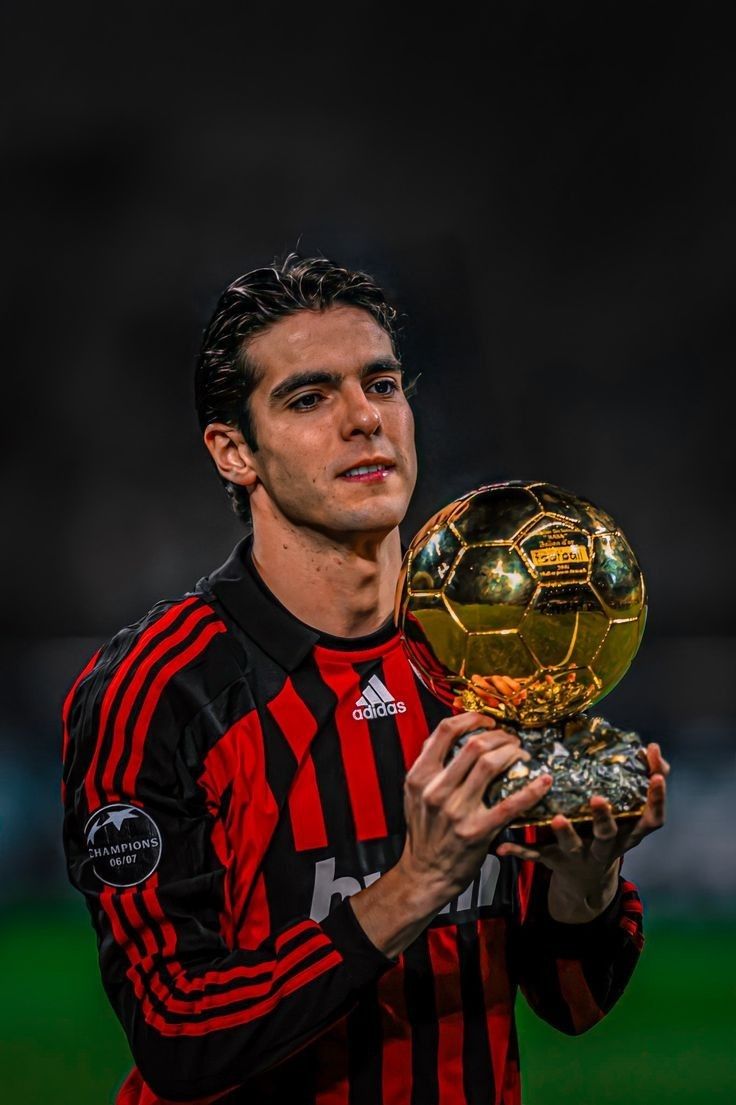 Ricardo Kaká in AC Milan jersey holding the Ballon d'Or trophy — vintage football shirt collector's piece