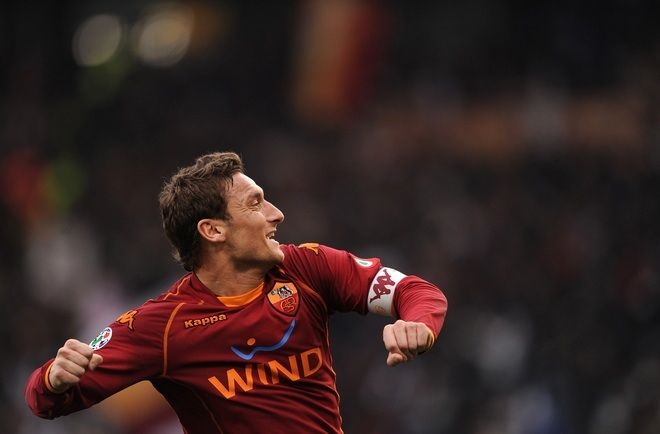 Francesco Totti wearing the iconic AS Roma number 10 jersey – vintage football shirt collector's item